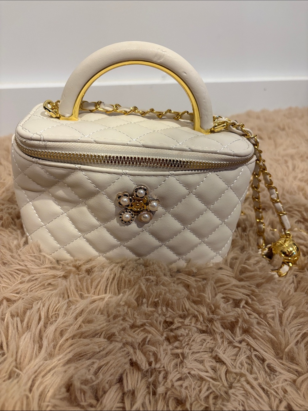 Elegant Cream Quilted Top-Handle Mini Bag with Gold Chain